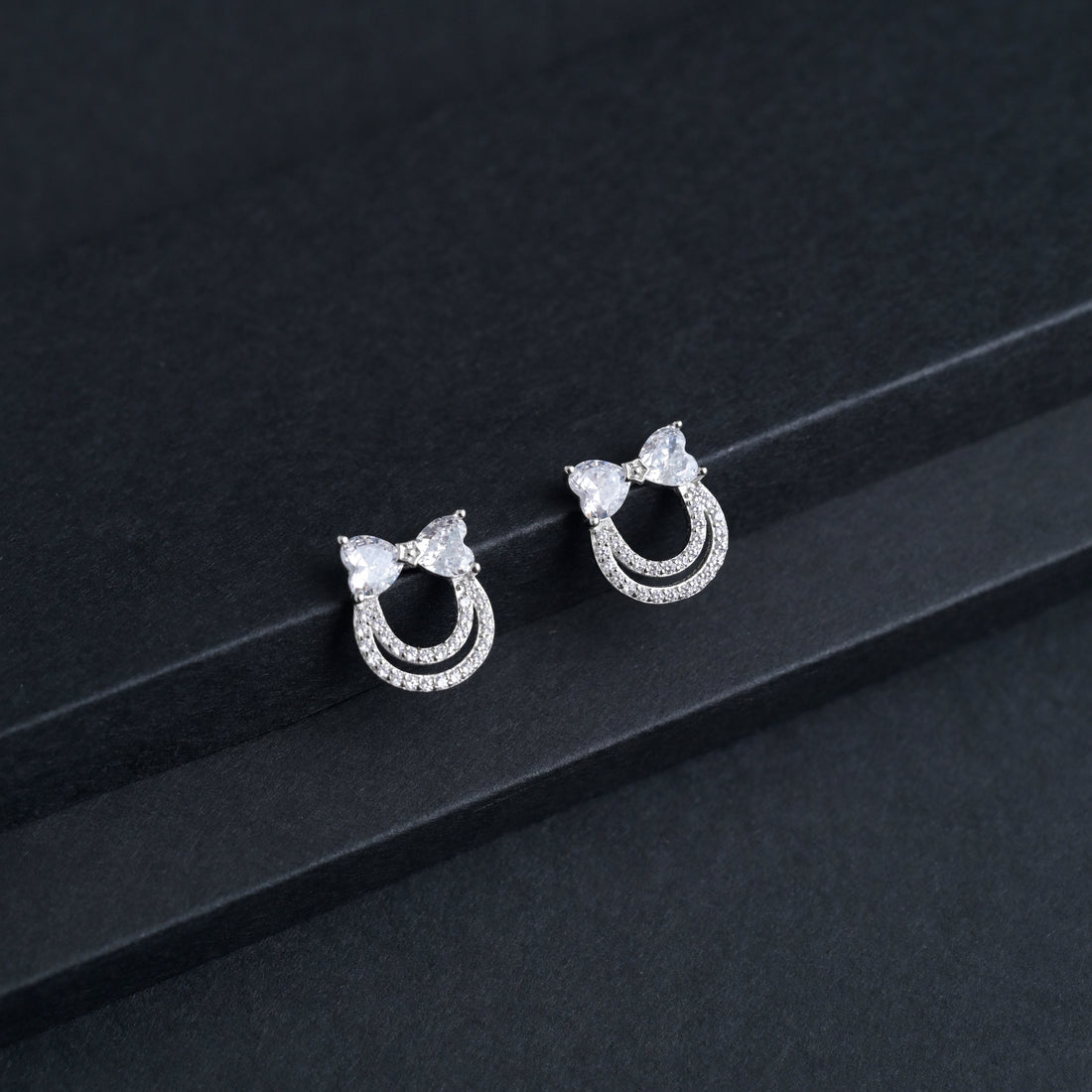 Silver Dainty Bow Earrings image 0